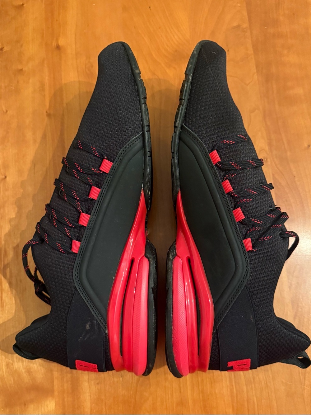 Puma Men's Black Knit Athletic Sneakers with Red Accents